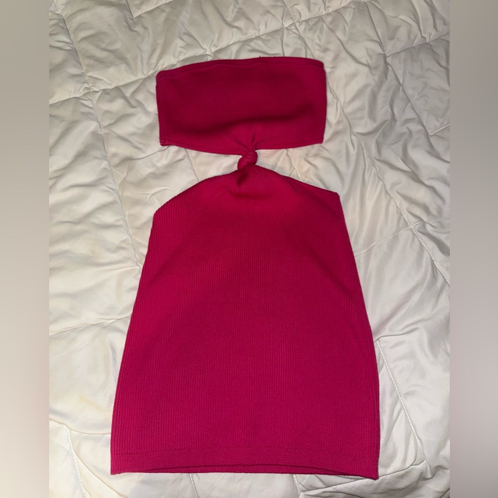 Pink mini dress with knot separating top and skirt